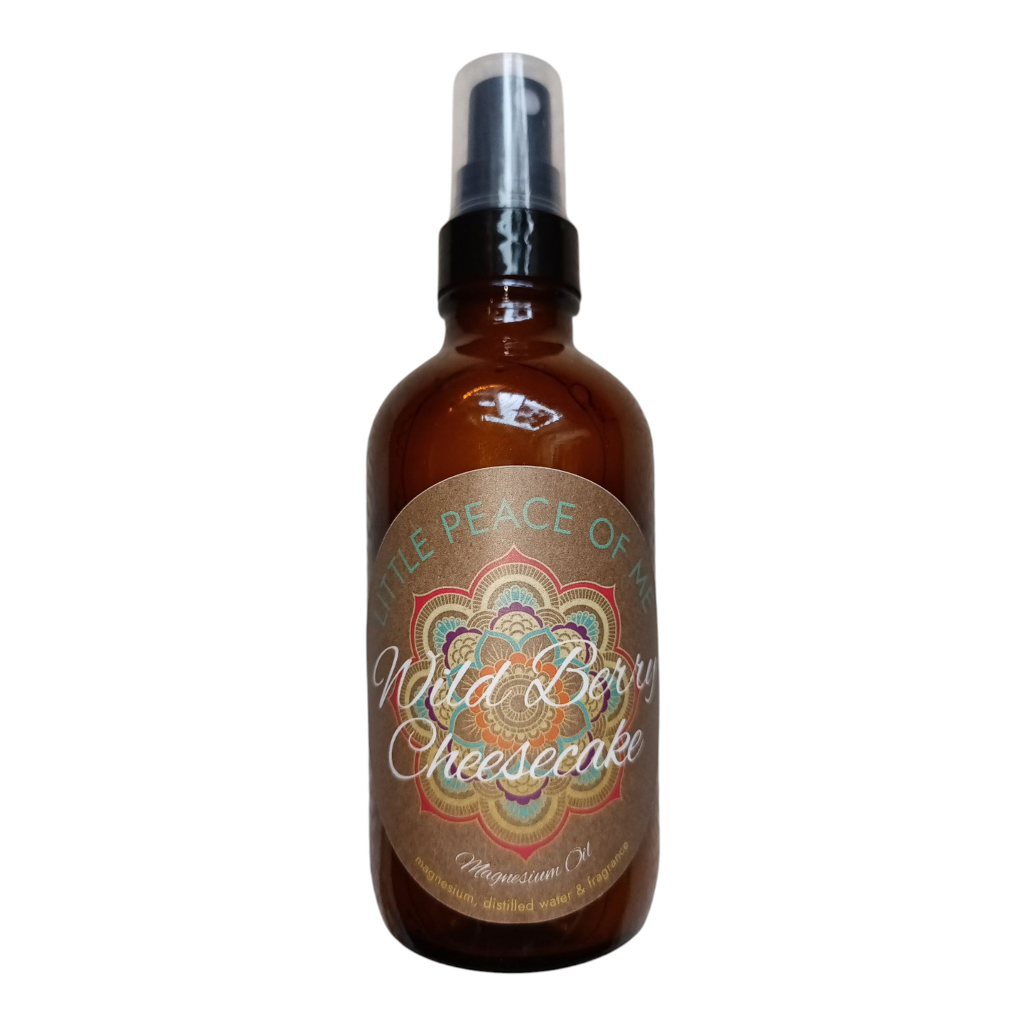 4 oz spray bottle dark in color with the label that reads little piece of knees wild berry cheesecake magnesium oil sitting on a white backdrop