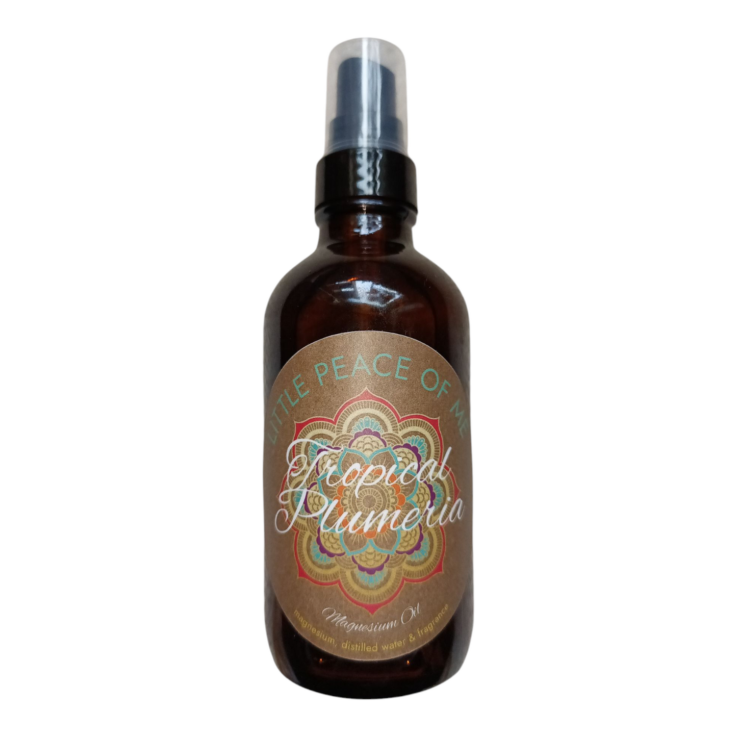 4 oz glass bottle dark in color with a tan label that reads Little piece of Me tropical Plumeria magnesium oil on a white backdrop