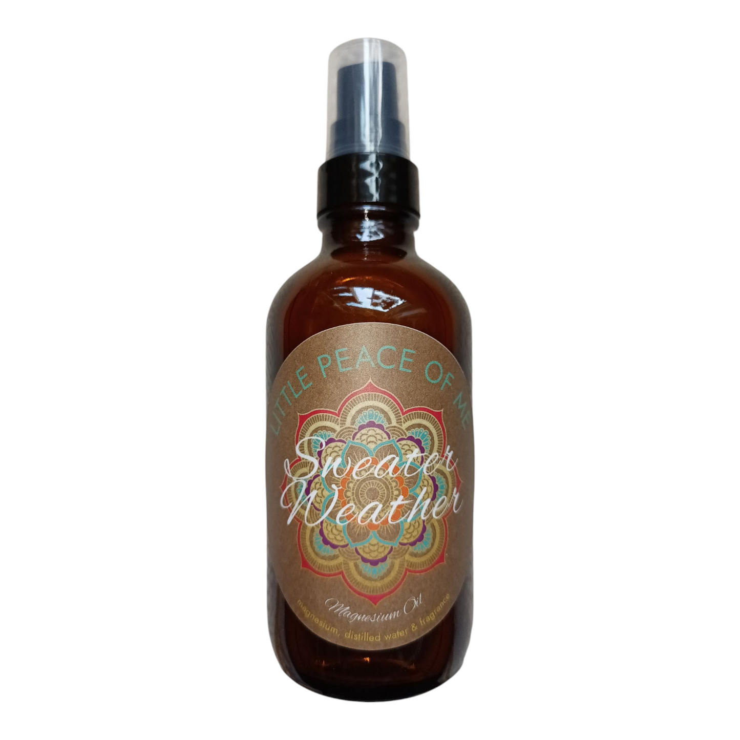 4 oz glass dark Boston spray bottle with tan label that reads Little piece of Me sweater weather magnesium oil on a white backdrop