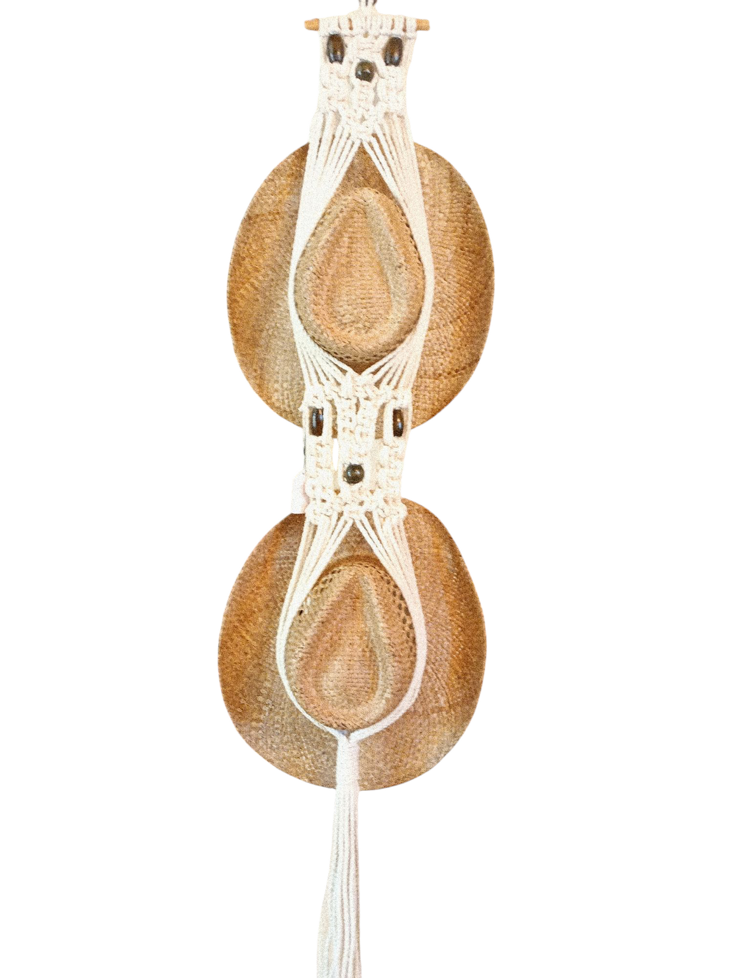 Handcrafted Boho Hat Hanger in woven macramé style, designed to store hats and add a decorative touch to your space. Holds two hats. White with dark beads. 
HAT NOT INCLUDED.