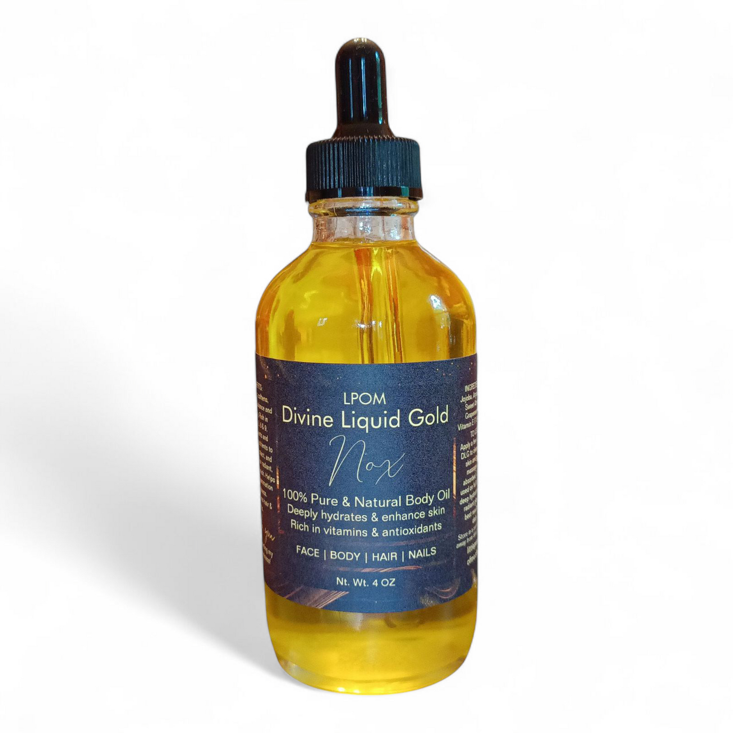 Glass clear dropper 4 oz bottle with black label and gold print that reads lpom Divine Liquid Gold Nox on a white background with a light shadow
